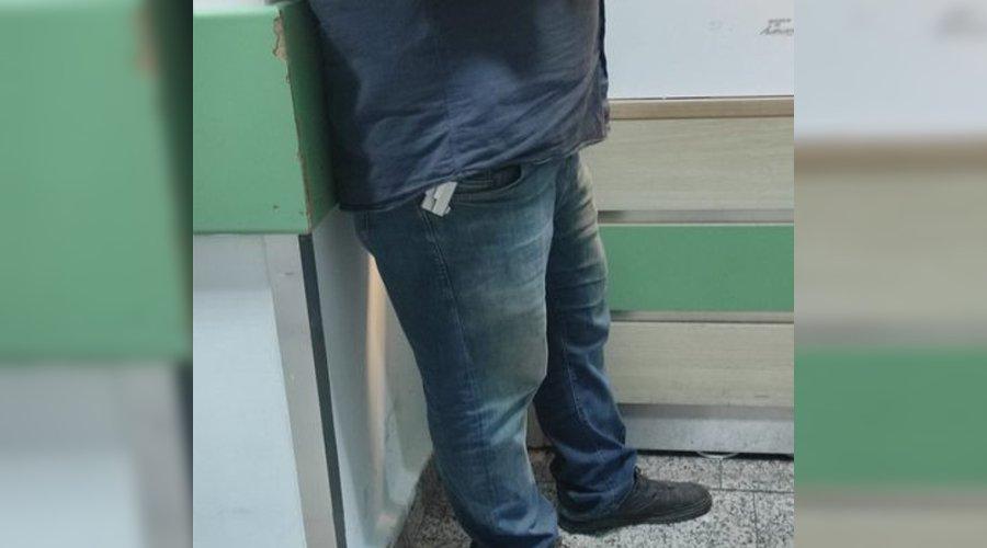 Hastanede tomografi sırasındaki silahlı kişiyi görüntüledi: 'Çıkarıp ateşlemeyeceğinin garantisi var mı?'