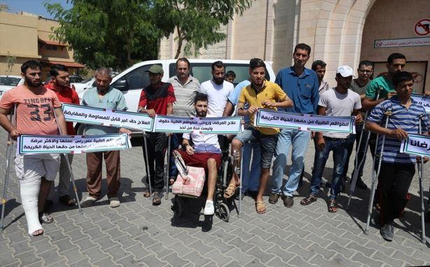 Gazzeli doktorlardan 'Tedavi hakkına dokunulamaz' protestosu