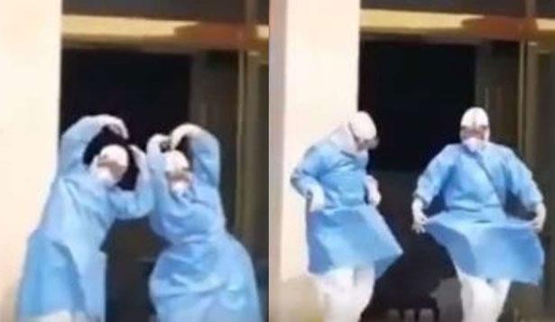 Çinli 2 doktorun koronavirüs hastalarını iyileştirdikten sonraki dansları olay oldu!